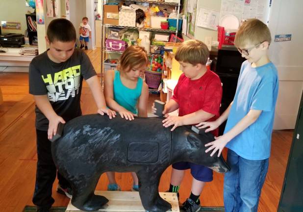 The students of the Green Trees Early Learning Center in Milford are pictured getting their bear ready for the &quot;Artful Bear Picnic&quot; on Saturday, Aug. 11, on the Community House lawn in Milford, at the corner of Broad Street and Hartford Street. Pictured (from left): Mathew Sicina, Madison Krok, Anthony Oliver, Bryce Hopper.
