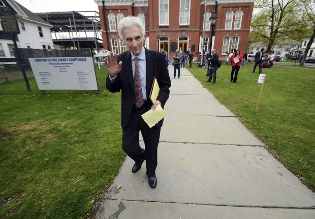 Bill Ruzzo, defense attorney for cop killer Eric Frein, leaves the Pike County Courthouse in Milford, Pa., on Wednesday, April 26, 2017, during a break in the sentencing of Frein. Frein, the would-be revolutionary who shot two Pennsylvania troopers, one fatally, in a late-night attack at their barracks, was sentenced to death late Wednesday. (Butch Comegys/The Times &amp; Tribune via AP)