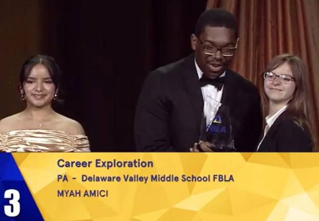 Myah Amici, representing the Delaware Valley Middle School FBLA, accepts her award in the category of career exploration.