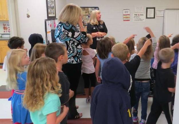 Finding notes in the nurse’s office (Photo by Peg Snure)