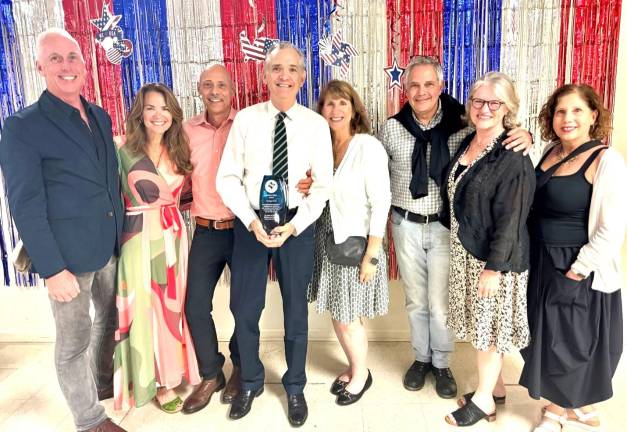 L to R: Doug Manion, Megan Strub, Javier Morales, Mayor Sean Strub, PCDC Chair Lisa Miller, Phila DA Larry Krasner, Lisa Rau, and Ronda Goldfein.