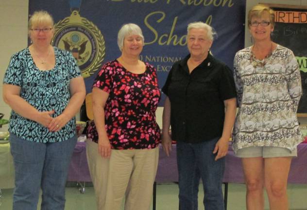 The guild's new officers: President Marie Sandhauer, Vice-President Nancy Halloren, Secretary Karen Batalan, and Treasurer Nancy Giancontieri (Photo provided)