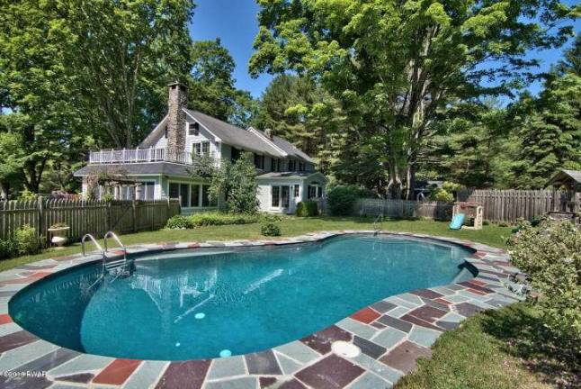 An exclusive five-bedroom home, with privacy and pool