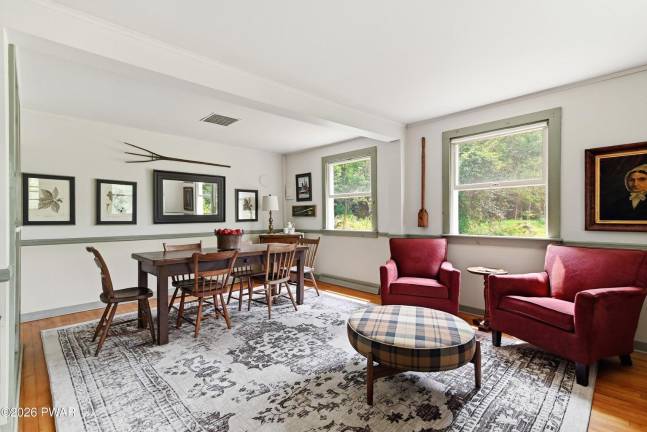 Enjoy the river views from this chic country farmhouse