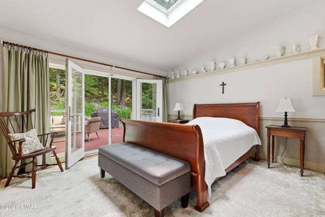 Enjoy the river views from this chic country farmhouse