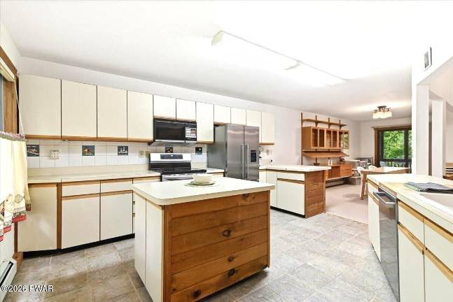 Lakefront luxury with private dock on one-plus acre