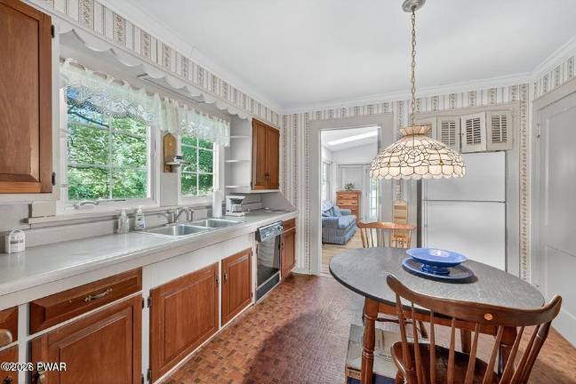 Updated farmhouse offers character, privacy and a walkable lane to town