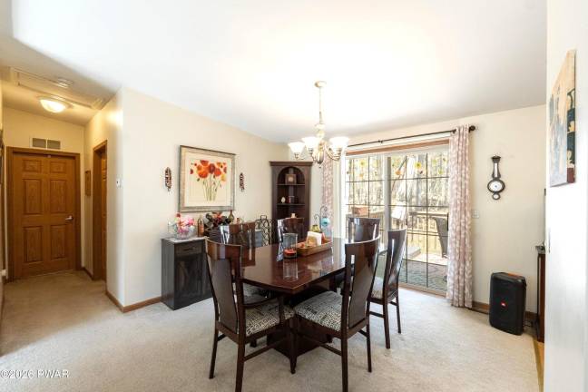 Ranch offers one-level living with extra space and lake access