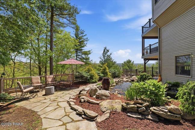 Experience luxury indoor-outdoor living on a mountaintop retreat