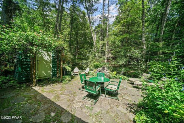 You’ll find this nature lover’s private paradise by a babbling brook