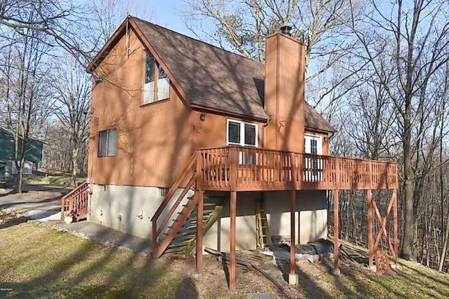 Saltbox with lake access and land