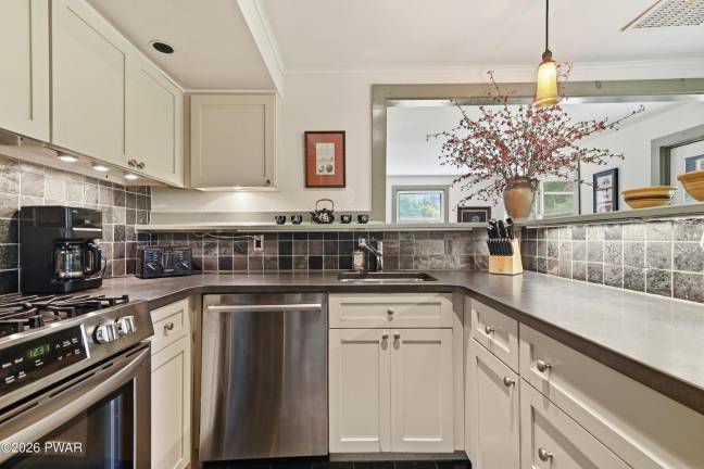 Enjoy the river views from this chic country farmhouse
