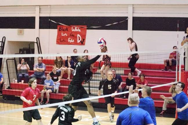 Delaware Valley Warrior RafaelAlexandre strikes the ball