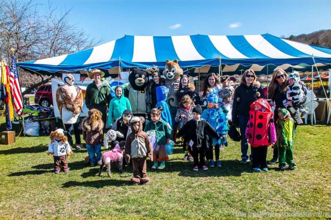 Photos provided Locals dress as animals and plants as part of the Earth Fest Species Parade.