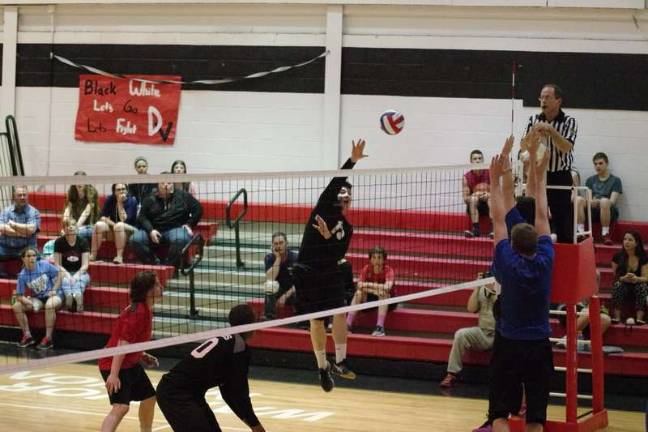 Delaware Valley's John Natiello strikes the ball as Hanover Area defenders rise to challenge