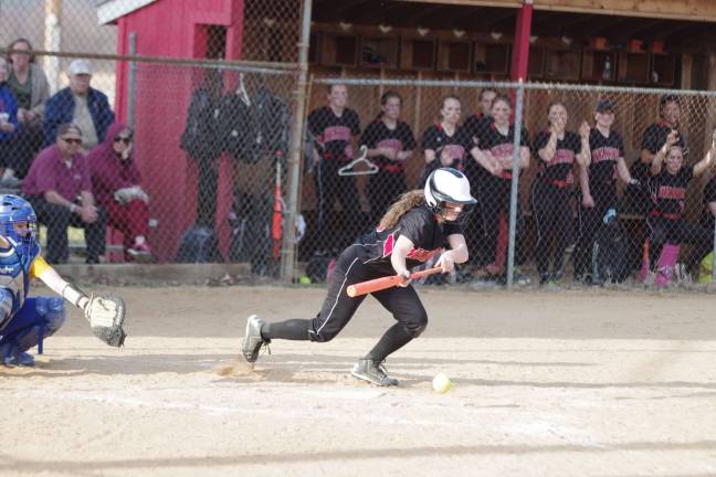 A Delaware Valley Warrior bunts.