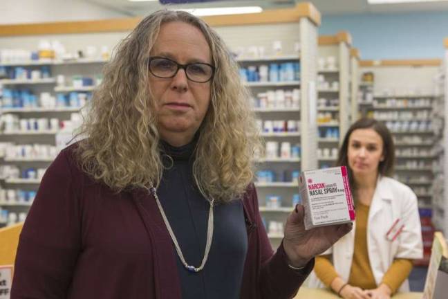 Physician General Joins School Nurse to Fill Naloxone Prescription