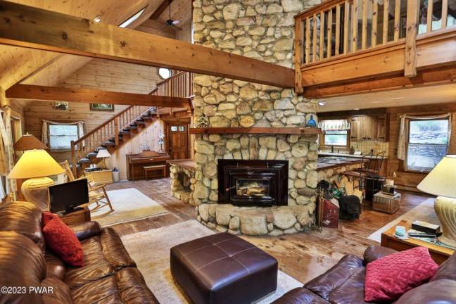 This custom log home is surrounded by nature