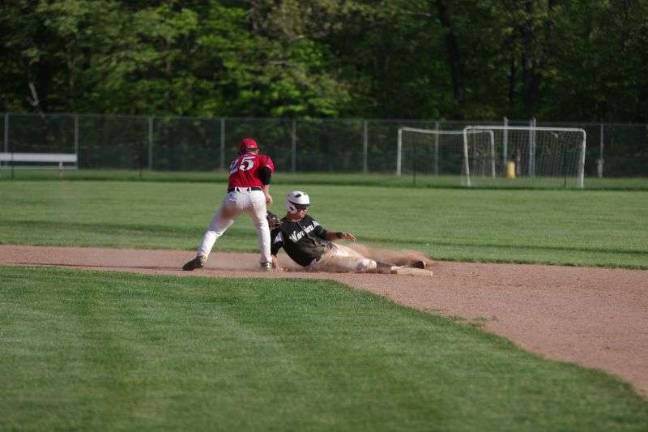 The Honesdale second baseman tags out a Delaware Valley runner.