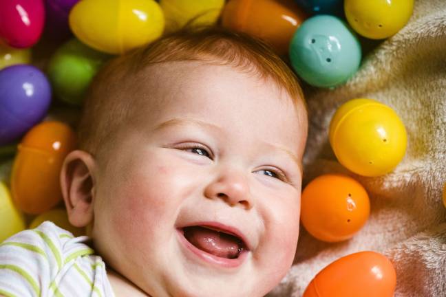 Photo, Mariana Feely of Monroe 10 month old Patrick was having a fun time playing with the Easter eggs.