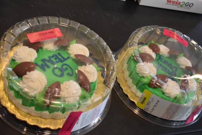 Football-themed cakes from Weis were among the shelf-stable donated goods at Harvest House on Jan. 31.