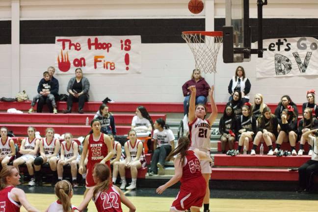 Delaware Valley’s Hannah Gallagher (21) launches the ball towards the hoop. She scored ten points.