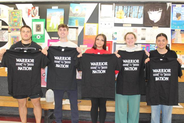 Some of DVHS Students of the Month showing off their Warrior Nation t-shirts.