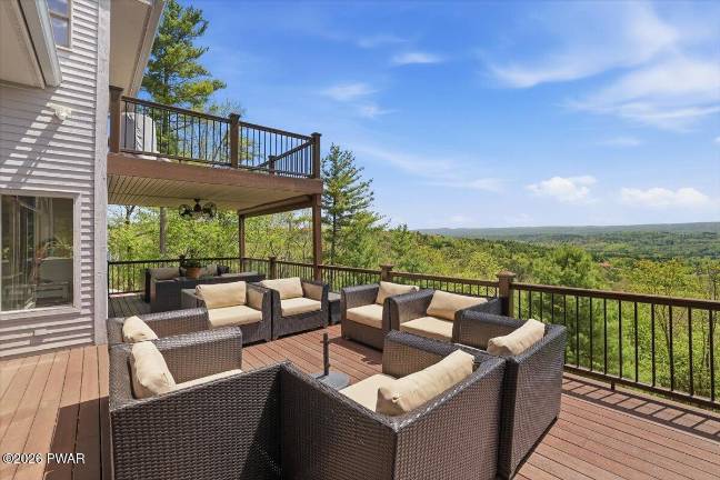 Experience luxury indoor-outdoor living on a mountaintop retreat