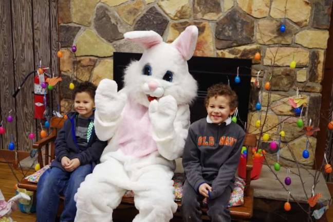 The Easter Bunny is joined by the Berrios siblings — Dameon, 8, and Dakota, 5 — of Milford