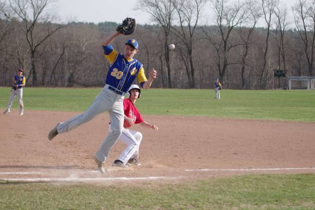 The ball gets away from the Valley View first baseman allowing a Delaware Valley runner a chance to head to second base.