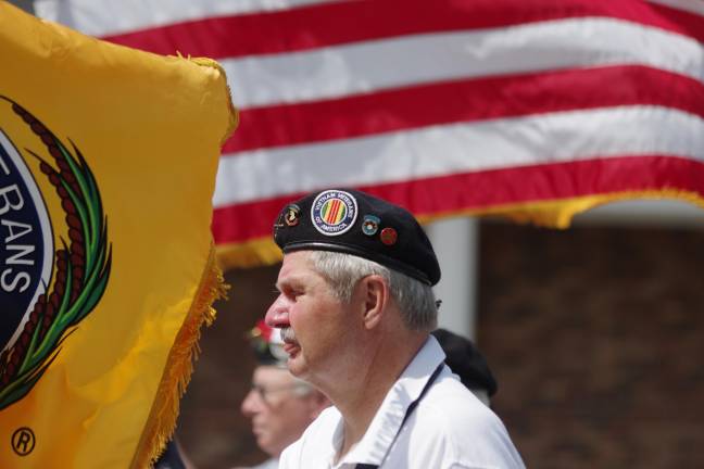 A veteran marches in the 2015 Milford Memorial Day parade.