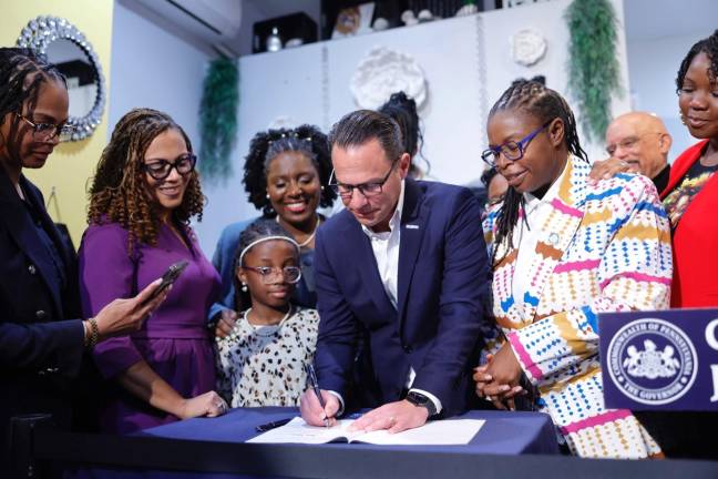 Governor Josh Shapiro joins elected officials and local business owners to sign House Bill 439 into law, officially prohibiting discrimination based on a persons hair type, hair texture, or hairstyle in Pennsylvania.