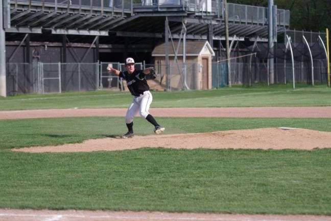 Delaware Valley pitcher Trevor Bertsch turns to throw the ball to first base. Bertsch pitched five scoreless innings.