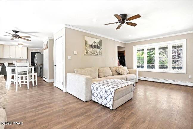 Enjoy country living and lake access in a spacious four-bedroom home