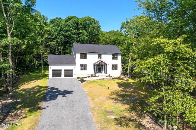 Brand new custom 4-bedroom, 3-bath home is surrounded by nature