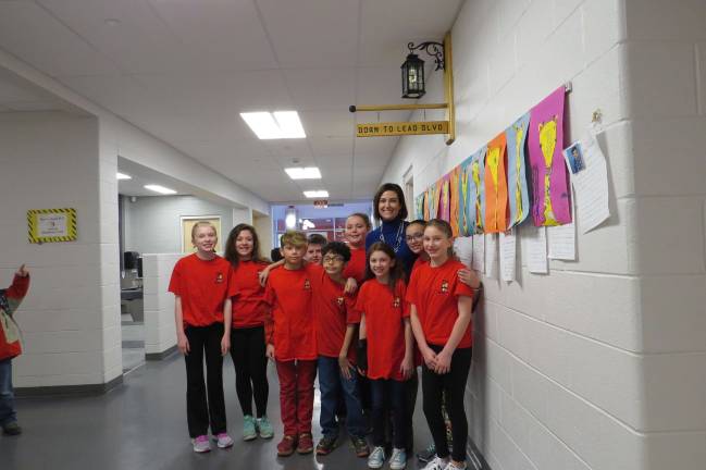 From left: Katharine Quinn, Baylee Lack, Gavin Jara Schneider, Aidyn Campbell, Jeruan Patton, Emily Cabrera Agostini, Hailey Ryan, Mrs. Olsommer, Olivia Rowehl, and Kaylee Kurcon (Photo by Peg Snure)