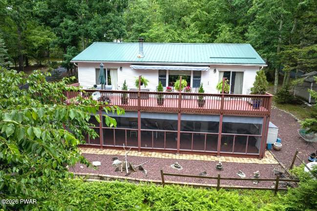 Walk down to your boat dock from this lakefront bi-level
