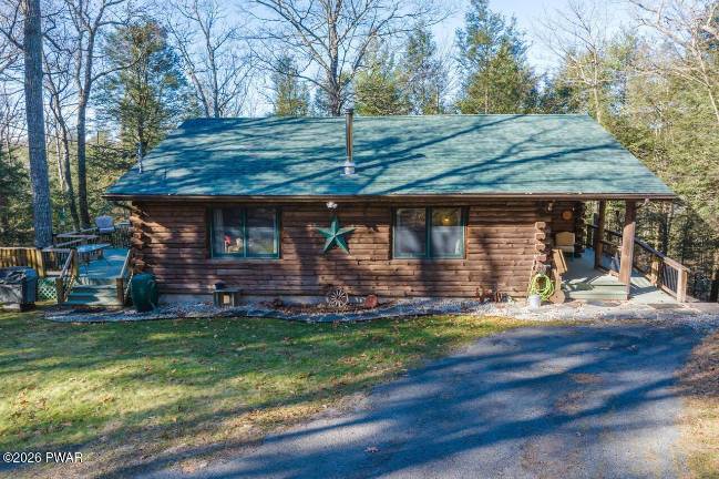 Log home combines rustic charm with modern amenities