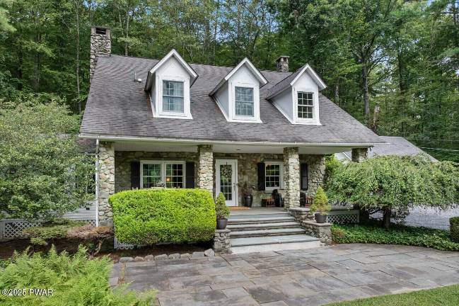 Stone home is updated with timeless elegance