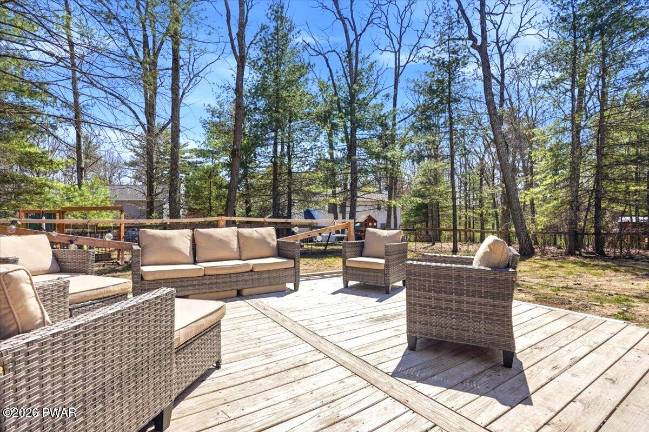 Enjoy country living and lake access in a spacious four-bedroom home