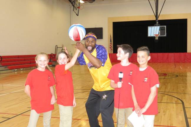 From left: Gianna Zellmer, Zoe LeMay, Rocket, Samuel Yost, and Ryder Machado (Photo provided by Peg Snure)