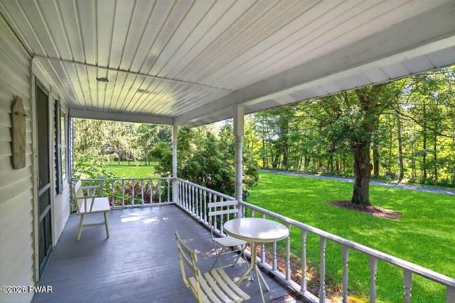 Updated farmhouse offers character, privacy and a walkable lane to town