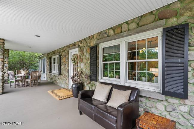 Stone home is updated with timeless elegance