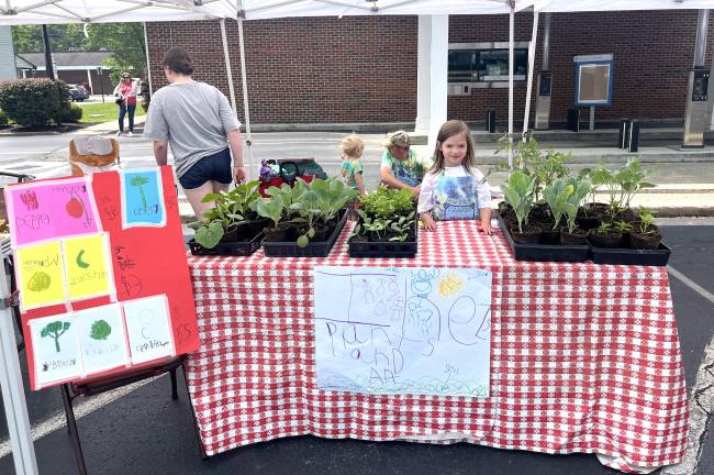A young entrepreneur at the 2025 fair.