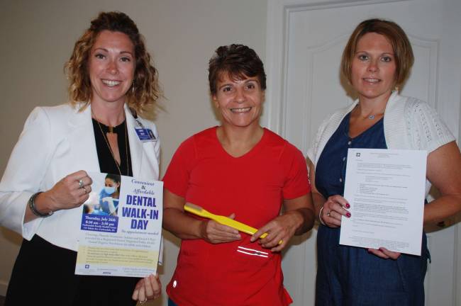 Laura Resti, outreach and enrollment counselor, Wayne Memorial Community Health Centers; Lori Wood, Together for Health Dental Center; and Rebecca Mead, outreach and enrollment counselor with Wayne Memorial Community Health Centers. (Photo provided)