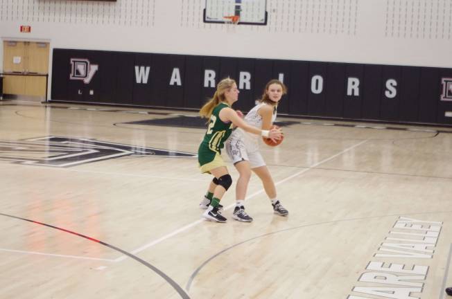 A Notre Dame Spartan covers a Delaware Valley Warrior.