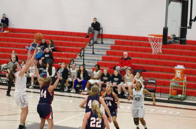 Far left: Delaware Valley’s Hannah Gallagher releases the ball during a shot. Gallagher scored six points.