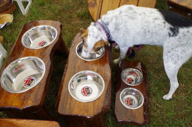 Pet food dish tables were made by Krista Strehle of Strehle's Outdoor Furniture of Lake Ariel, Pa. Owner Henry Strehle and his daughter Krista make the items sold by the store.