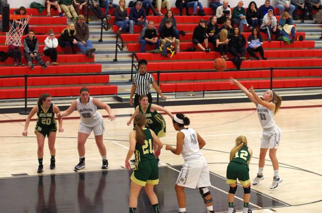 Delaware Valley Warrior Shelby Brittain throws the ball from the foul line. Brittain scored six points.