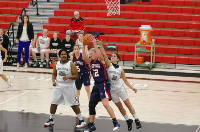 Riverside’s Lizzy Spindler grabs the ball during a rebound